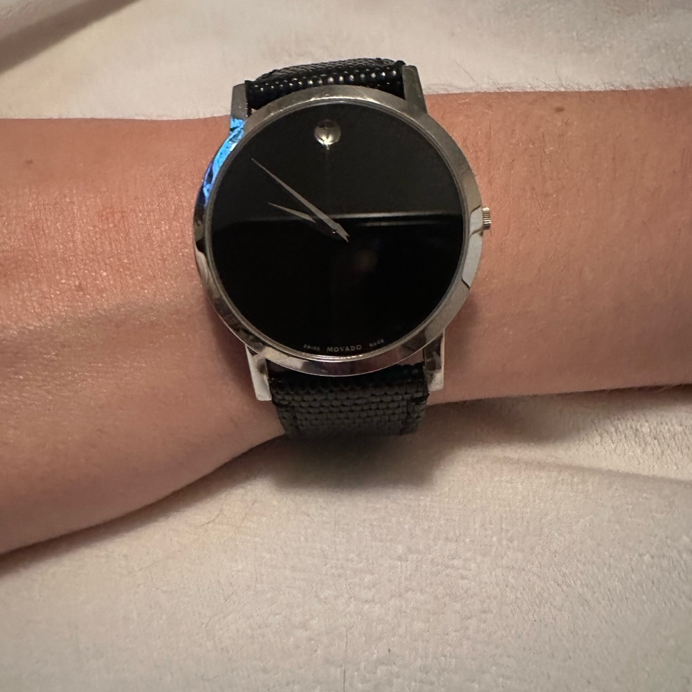 Movado black and silver watch